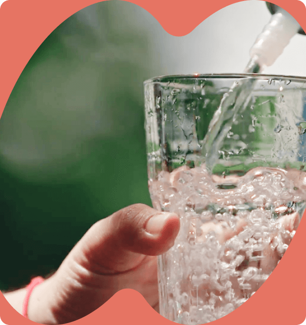 A glass being filled up by a filter.